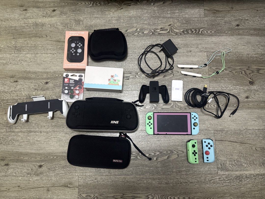 Nintendo Switch bundle (Category: Nintendo) located in Manila. Submitted by mica_03 (Listing ID 1463000576, Image 1). Description: - Nintendo Switch Console - Gaming Grip - Extra Controllers - Carrying Cases - Charging Cables - digital games - price is negotiable Pm for details .