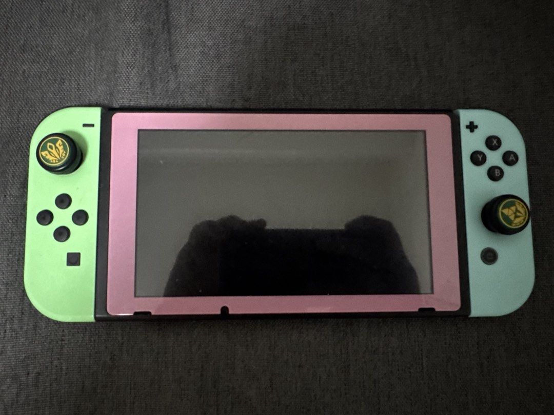 Nintendo Switch bundle (Category: Nintendo) located in Manila. Submitted by mica_03 (Listing ID 1463000576, Image 2). Description: - Nintendo Switch Console - Gaming Grip - Extra Controllers - Carrying Cases - Charging Cables - digital games - price is negotiable Pm for details .
