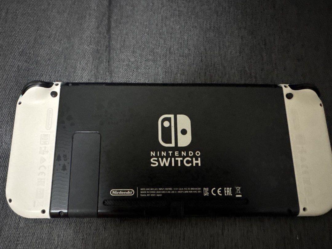 Nintendo Switch bundle (Category: Nintendo) located in Manila. Submitted by mica_03 (Listing ID 1463000576, Image 3). Description: - Nintendo Switch Console - Gaming Grip - Extra Controllers - Carrying Cases - Charging Cables - digital games - price is negotiable Pm for details .