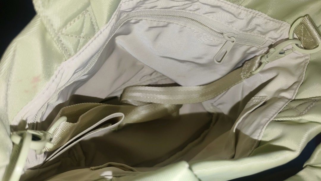 Off Toco Tote Bag Light Green Nylon (Category: Tote Bags) located in Manila. Submitted by rare.elieli (Listing ID 1463068901, Image 3). Description: - Light green Oli Coco tote bag - Made of durable nylon material - Main compartment with an inner zip pocket - Detachable shoulder strap included - Ideal for everyday use and errands.