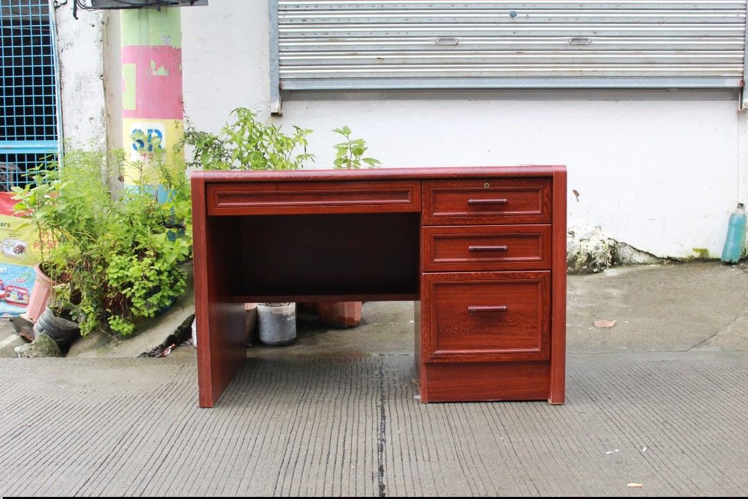 Office Table (Category: Tables & Sets) located in Meycauayan. Submitted by marygracecasimiro (Listing ID 1463070410, Image 1). Description: Wooden Executive Office Desk Classic wooden executive office desk with a rich reddish-mahogany finish, spacious work surface and four drawers. Perfect for offices, supervisors, managers or home workspaces L:44 ¾ • W:26 ¾ • H:29 inches 8,600 pesos only💚 #highlights #followersandnonfollowers.