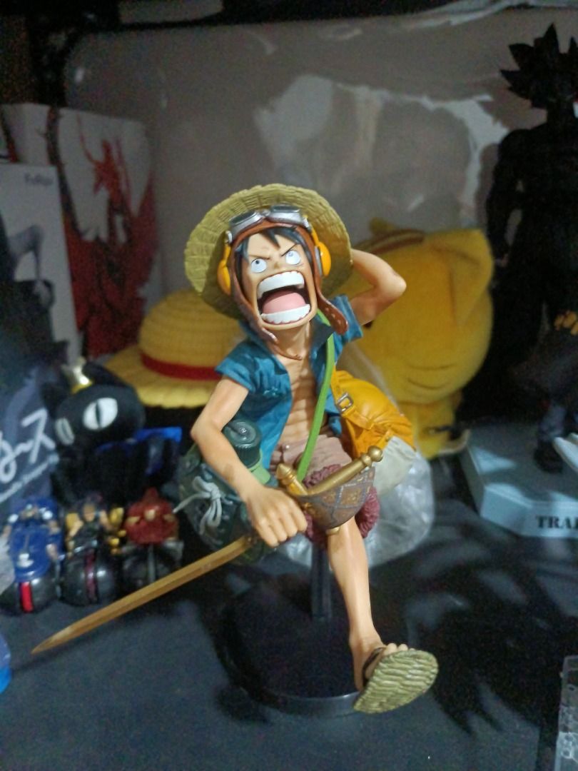 One Piece Monkey D. Luffy Action Figure (Category: Figurines & Statues) located in San Leonardo. Submitted by burgossanleonardo.12345 (Listing ID 1463058205, Image 2). Description: - Dynamic Monkey D. Luffy action figure - Ready for adventure pose - Includes iconic straw hat - Comes with accessories - Perfect for any One Piece fan's collection - Display stand included - BIB - Missing stick - 700 without sword - 1500 with sword Selling as set.