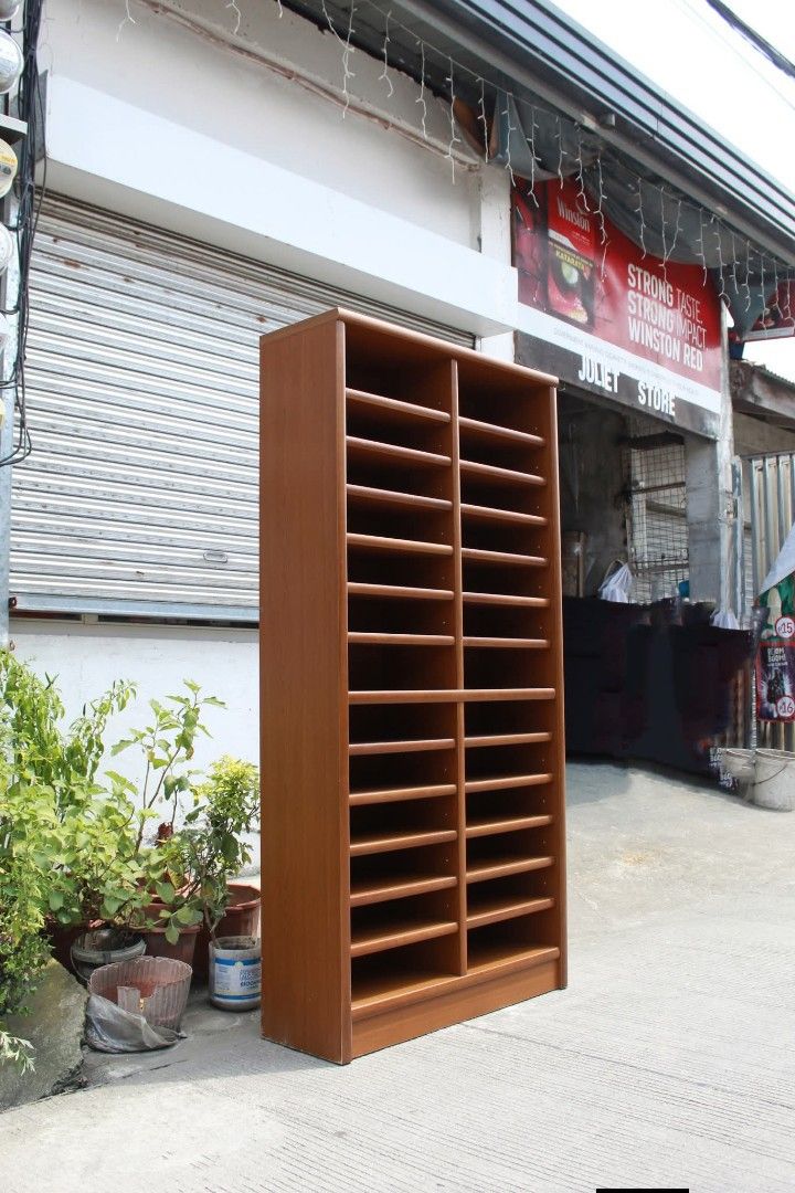 Open Shelves (Category: Shelves, Cabinets & Racks) located in Meycauayan. Submitted by marygracecasimiro (Listing ID 1463049722, Image 3). Description: 26-Slot Wooden Literature Organizer / Bookshelves Sturdy frame, heavy and a warm teak-style finish. Perfect for organizing documents, mail, magazines, office supplies, shoes or craft materials. Ideal for offices, home workspaces and creative storage solutions L:35 ¾ • W:12 • H:71 inches 11,900 pes