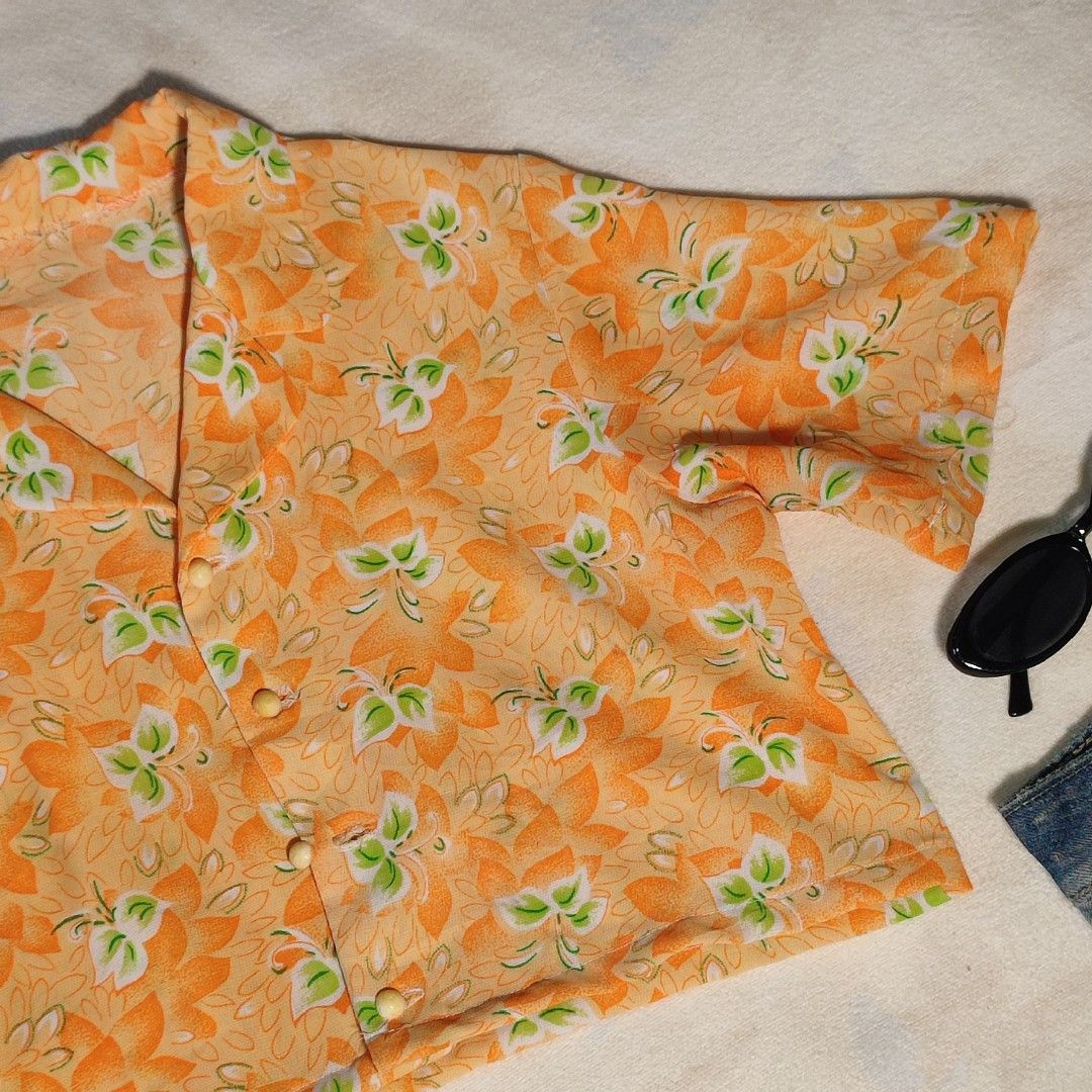 Orange Floral Button-Up Cropped Shirt (Category: Shirts) located in Antipolo. Submitted by _lovedbychie (Listing ID 1462896406, Image 3). Description: 🌸 Size: S-M 🌸 Bust: 34" - 36" • Length: 15.5" 🌸 MOP: Gcash / Maribank 🌸 MOD: J&T / LBC / Lalamove Message me for more info!.