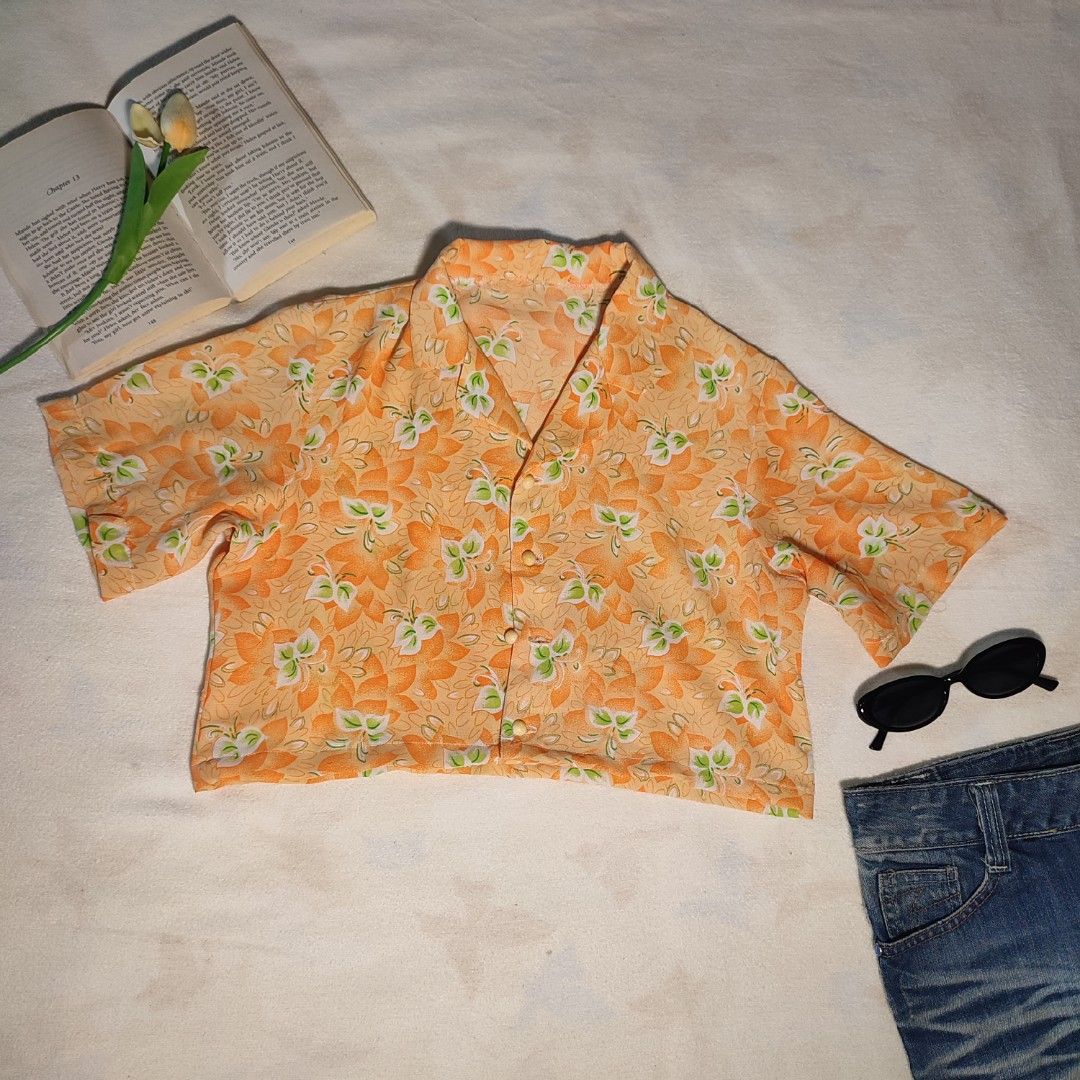Orange Floral Button-Up Cropped Shirt (Category: Shirts) located in Antipolo. Submitted by _lovedbychie (Listing ID 1462896406, Image 1). Description: 🌸 Size: S-M 🌸 Bust: 34" - 36" • Length: 15.5" 🌸 MOP: Gcash / Maribank 🌸 MOD: J&T / LBC / Lalamove Message me for more info!.