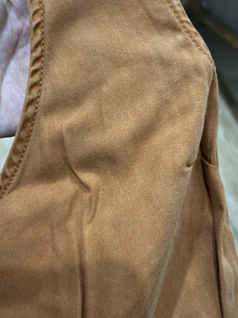 Orange Romper (Category: Rompers) located in Manila. Submitted by shiezzels (Listing ID 1463073500, Image 3). Description: non stretchy fabric Has two side pockets working buttons Fits small to medium.
