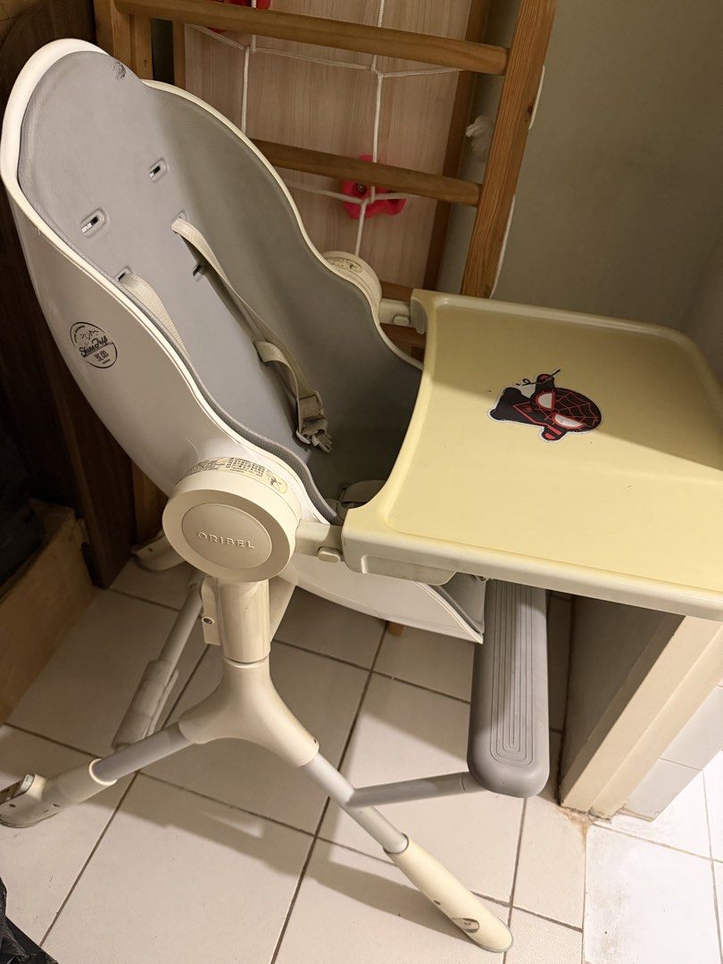 Oribel Cocoon High Chair with Tray (Category: Baby High Chairs) located in Quezon City. Submitted by woodyscent (Listing ID 1462977588, Image 1). Description: Oribel high chair. Comes with a removable tray. Has a 5-point harness for safety. The seat is padded and easy to wipe clean. The tray has a sticker on it. Legs are adjustable. Great for feeding your little one..