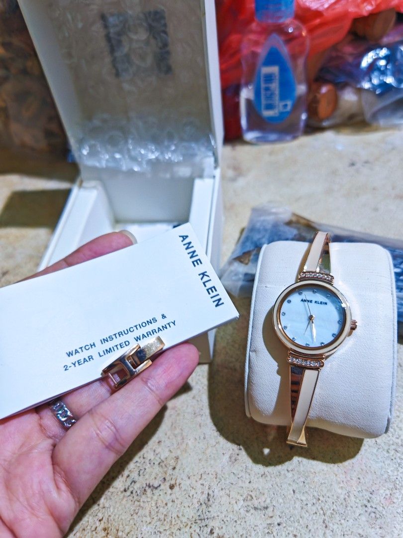 Orig Anne Klein Bangle Watch (Category: Women's Watches) located in Taguig. Submitted by mystuff4youph (Listing ID 1463058879, Image 1). Description: - Auth Anne Klein bangle watch - Rose gold tone - Mother-of-pearl dial with crystal accents - with extra links - Includes original box and watch instructions/warranty booklet - Guaranteed orig or moneyback .