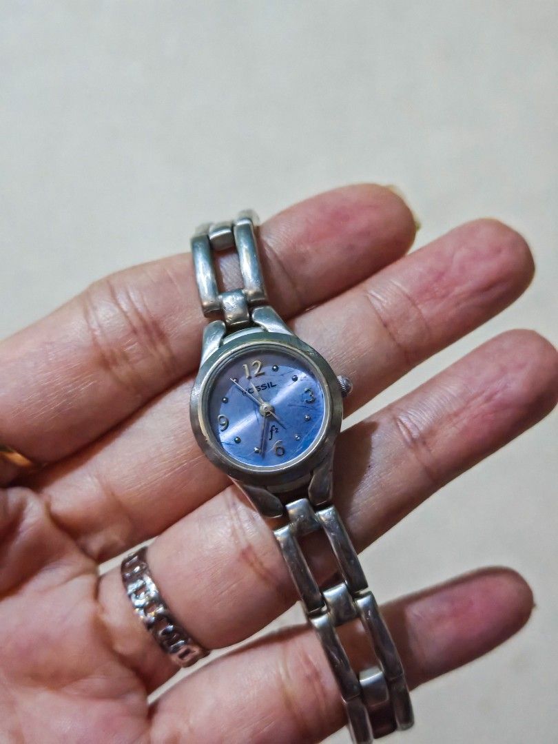 Orig Fossil Dainty Watch (Category: Women's Watches) located in Taguig. Submitted by mystuff4youph (Listing ID 1463062105, Image 3). Description: - Orig Classic Fossil watch - Light blue dial - Silver-tone metal band - Model number: ES-9090 - Great for everyday wear - perfectly working - vergood condition Minimal scratches abut overall super nice pa Guaranteed orig, bought in Japan.