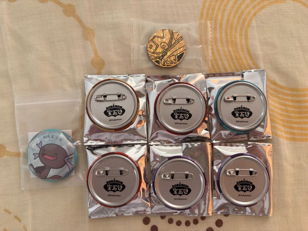 Original Gem Pack Pokemon Pins (Category: Character Goods) located in Quezon City. Submitted by seanshobbycorner (Listing ID 1462936777, Image 2). Description: Rockruff - 100 Houndoom - 100 Darkrai - 150 Flareon - 100 Gardevoir - 150 Wooper - 100 Banette - 50 Mudsdale - 25 Shipping shouldered by buyer Loc: QC near banawe .