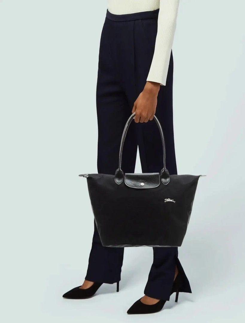 Original Longchamp Le Pliage Tote Bag Black (Category: Shoulder Bags) located in Cabuyao City. Submitted by secondhand.shop.ph (Listing ID 1462941401, Image 2). Description: Sale❗️Sale❗️Sale❗️ Original LONGCHAMP Preloved Black Medium Nylon & genuine leather trim 📌First to pay!.