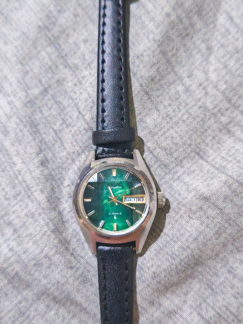 Original Seiko Automatic Green Dial Watch (Category: Women's Watches) located in Taguig. Submitted by mystuff4youph (Listing ID 1463064535, Image 3). Description: - Vintage Seiko Automatic Watch - Striking Green Dial - Diamond cut glass - 21 Jewels Movement - Day and Date Functionality - Durable Stainless Steel Case - Comes with a Black Leather Strap - Watch is in perfect working condition - No issue.