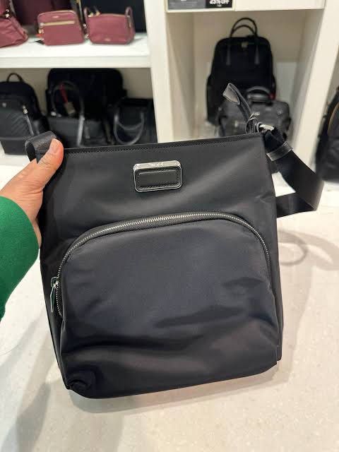 💯ORIGINAL TUMI CORPORATE CROSSBODY (Category: Sling Bags) located in Quezon City. Submitted by ashongsstore (Listing ID 1463115947, Image 1). Description: Super sale ✨ TUMI CORPORATE COLLECTION ✨ 🇵🇭AVAILABLE🇵🇭 Exclusive to Special Markets, this crossbody is the quintessential grab-and-go bag. It’s compact enough for everyday use, yet still spacious enough to hold essentials and then some. It’s crafted in lightweight nylon and features a mono