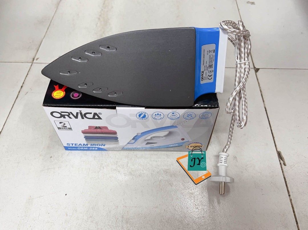 Orvica Steam Iron ORM-088 1200W (Category: Irons & Steamers) located in Manila. Submitted by chaionlineshop (Listing ID 1463038754, Image 2). Description: - Orvica Steam Iron, Model ORM-088 - Powerful 1200W - Stylish Blue and White design - Comes with power cord - Features a 2-year warranty (as per box) - Ideal for efficiently ironing clothes.