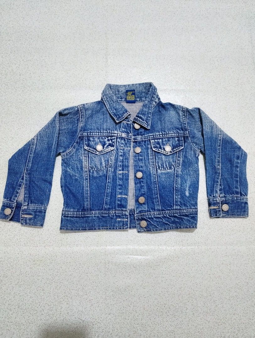 OshKosh B'gosh Kids Denim Jacket Size M (Category: Babies & Kids Fashion) located in General Santos City (Dadiangas). Submitted by rjb21 (Listing ID 1463020388, Image 1). Description: - Classic blue denim jacket for kids - Button-up front - Features chest pockets - Proudly made in the Philippines - Ideal for layering - Versatile and easy to style with any outfit - A wardrobe essential for children best fit 2-4 years old.