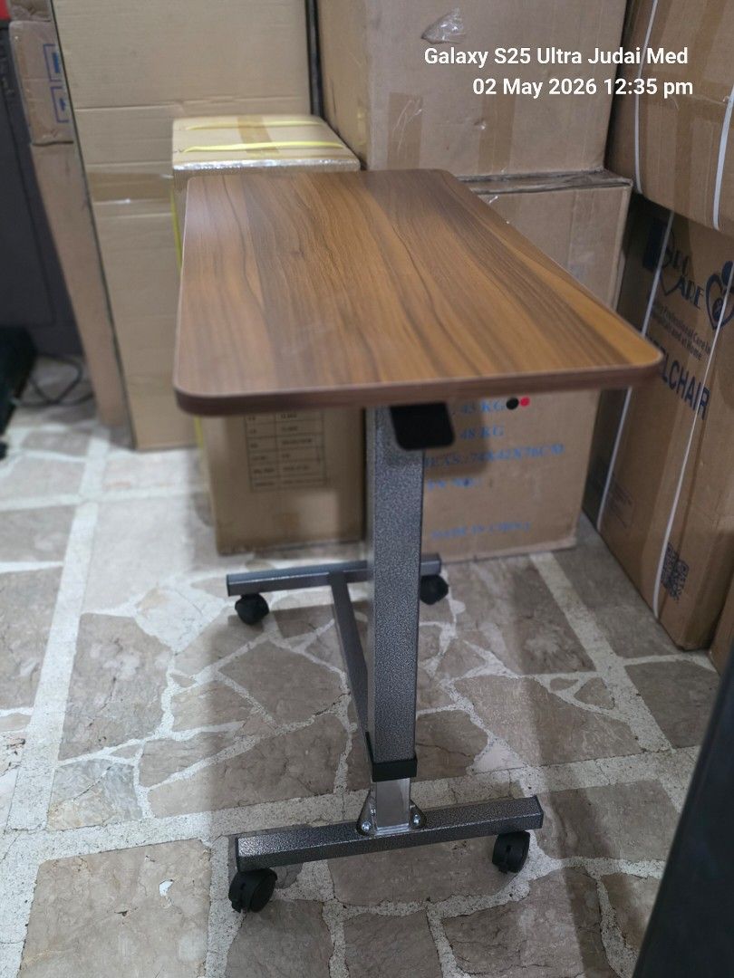 Overbed table (Category: Medical Supplies & Tools) located in Quezon City. Submitted by judaimedonlineshop23 (Listing ID 1463040288, Image 2). Description: overbed table adjustable height brandnew onhand.