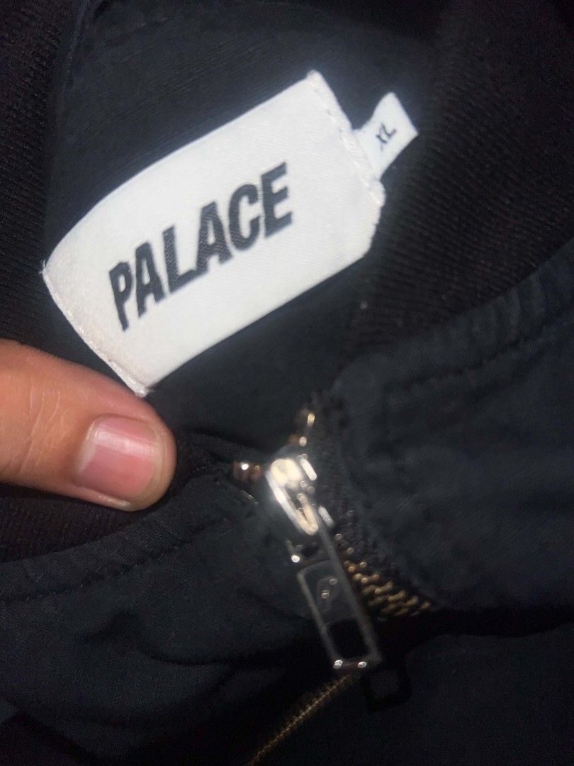 Palace Skateboards Ripstop Bomber Jacket XL Black (Category: Coats, Jackets and Outerwear) located in Taguig. Submitted by gakuyen.3 (Listing ID 1462931907, Image 3). Description: - Brand: Palace - Item: Bomber Jacket - Color: Black - Material: Ripstop Cotton - Size: XL - Features: Iconic Palace triangle logo on chest, zipper closure - Style: Great for everyday wear - Condition: Please check photos for details 25x30 dimension.