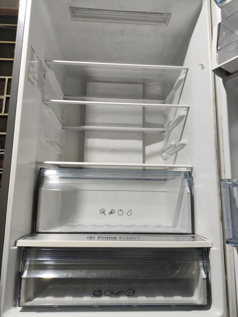 Panasonic Refrigerator - Japan Quality (Category: Refrigerators and Freezers) located in Cainta. Submitted by birthday.22 (Listing ID 1463113304, Image 3). Description: - Panasonic Refrigerator in good working condition. - Features 'Prime Fresh' compartment for extra-long freshness. - Equipped with 'Ag Clean' technology to eliminate odors and bacteria. - Ample shelf space for all your groceries. - Includes a 12-year warranty on the compressor for