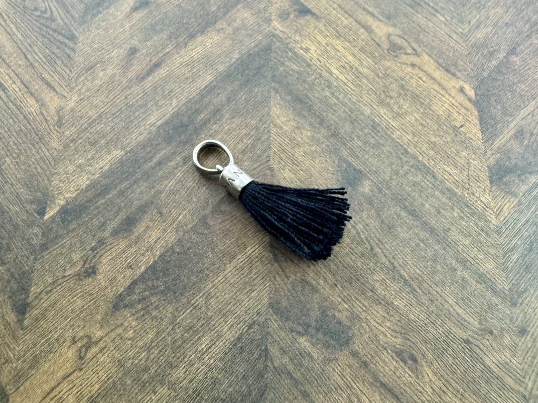 Pandora Black Tassel Pendant Charm (Category: Charms) located in Cabanatuan. Submitted by water.withahintoflime (Listing ID 1463010973, Image 2). Description: Retired|Authentic 🎗️Last Price Posted|Free Shipping|Less 100 on every one(1) addition. 🎗️No issue|No Packaging.