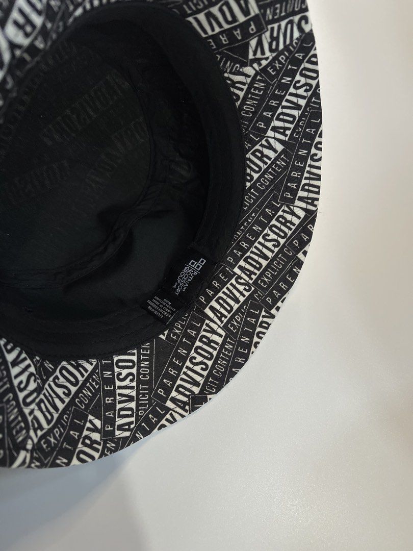 Parental Advisory Explicit Content Bucket Hat (Category: Hats & Beanies) located in Baler. Submitted by allthrifted31 (Listing ID 1462952922, Image 2). Description: - Black bucket hat - All-over 'Parental Advisory Explicit Content' print - Standard adult size - Ideal for festivals or adding an edgy vibe to your outfit.