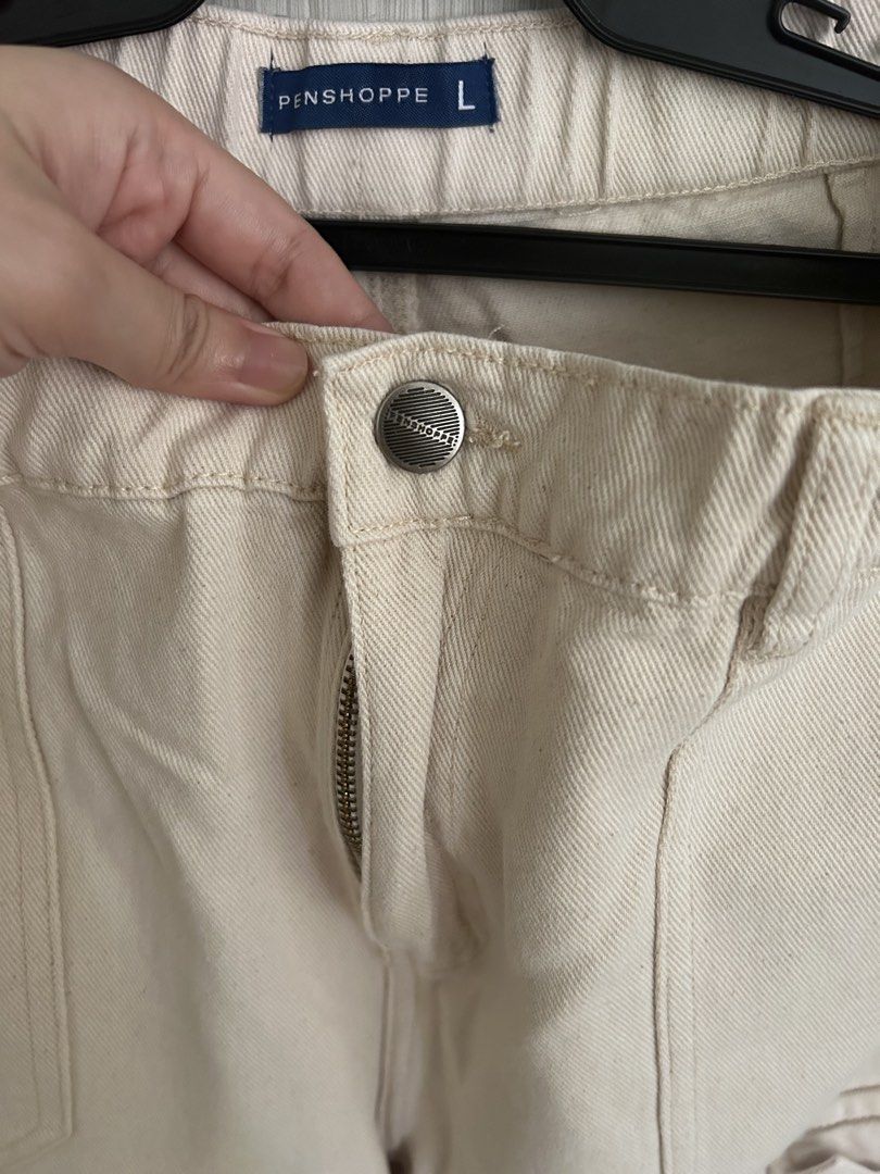PENSHPPE Beige Cargo Pants Size L (Category: Other Bottoms) located in Manila. Submitted by juvy13 (Listing ID 1462903423, Image 3). Description: - Beige cargo pants from PENSHPPE - Size: L - Closure: Zipper and button front - Features: Multiple pockets on front and sides - Material: Sturdy cotton twill fabric - Style: Great for casual wear.