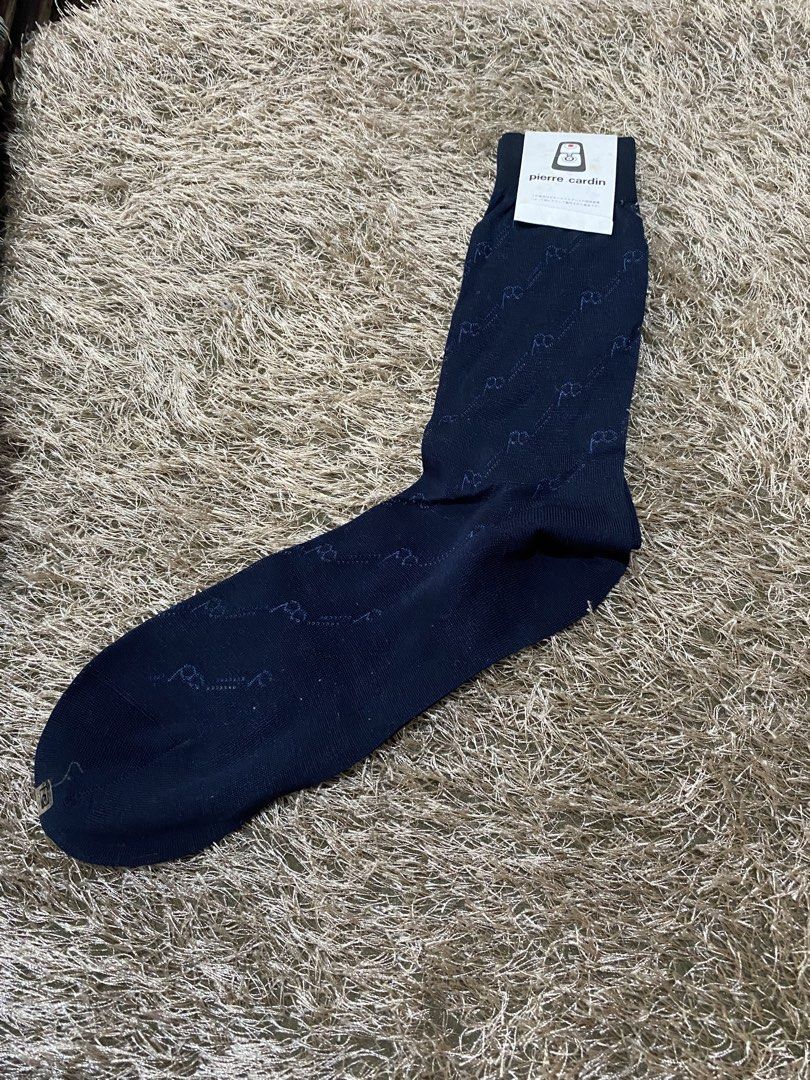 Pierre Cardin Navy Blue Patterned Socks Size M (Category: Socks) located in Bulacan. Submitted by rich2545 (Listing ID 1462901000, Image 2). Description: - Brand: Pierre Cardin - Color: Navy Blue - Pattern: Subtle Diamond - Size: M - Perfect for: Everyday wear or dressing up an outfit - Features: Comfortable and stylish.