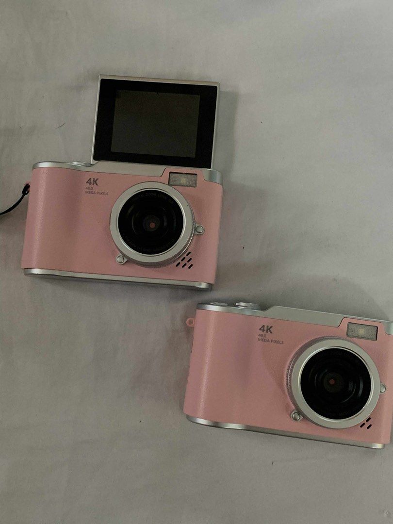 Pink 4K Digital Camera with Flip Screen (Category: Cameras) located in Manila. Submitted by fastbird_85d2e0 (Listing ID 1462965884, Image 1). Description: - Cute pink digital camera - Records in stunning 4K resolution - High-quality 48-megapixel photos - Flip-up screen, perfect for selfies and vlogging - Compact and easy to carry for on-the-go memories - Simple to use for everyone - Includes a convenient strap - Ideal for vlogging and everyday ph