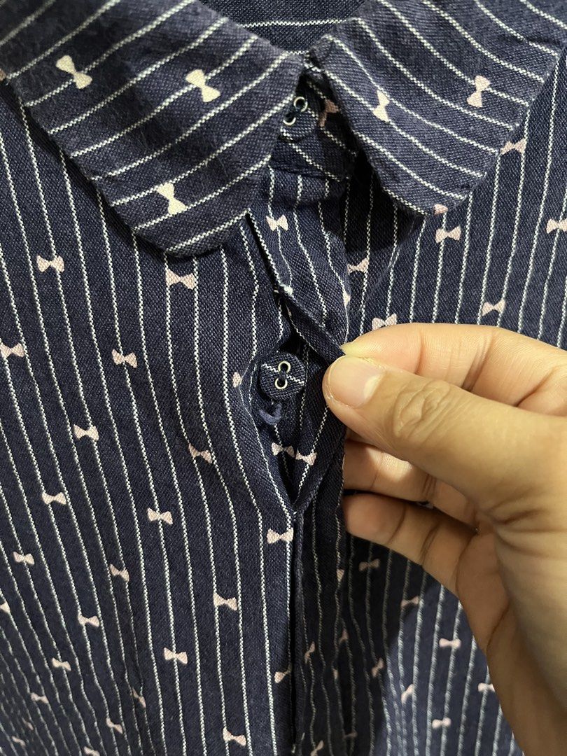 Pink Adobe Navy Blue Longsleeves with Pink Stripes and Bow Patterns (Category: Longsleeves) located in Marikina City. Submitted by femmeshoppemnl (Listing ID 1462947422, Image 3). Description: Pink Adobe Navy Blue Longsleeves with Pink Stripes and Bow Patterns Size: L-XL Condition: Lightly used. Hidden buttons, cute heart-shaped pocket. Cutesy! Issue: No issue Brand: Pink Adobe Ukay sourced. Washed - Ready to wear. .