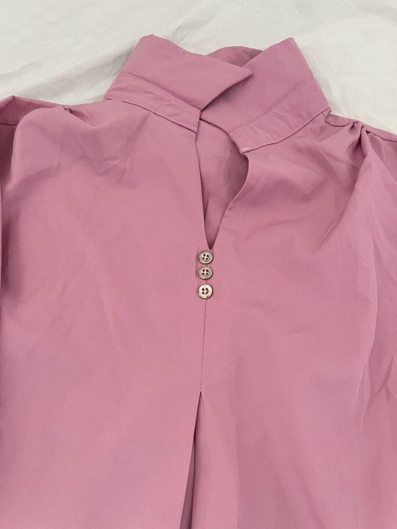 Pink Collar Blouse with Button Detail (Category: Blouses) located in Manila. Submitted by happydani (Listing ID 1462959621, Image 2). Description: - 4XL - pink blouse - Flattering V-neck with 3 buttons - Stylish three-quarter sleeves with cuff buttons - Beautiful pleated front for shape - Perfect for casual or dressed-up looks.