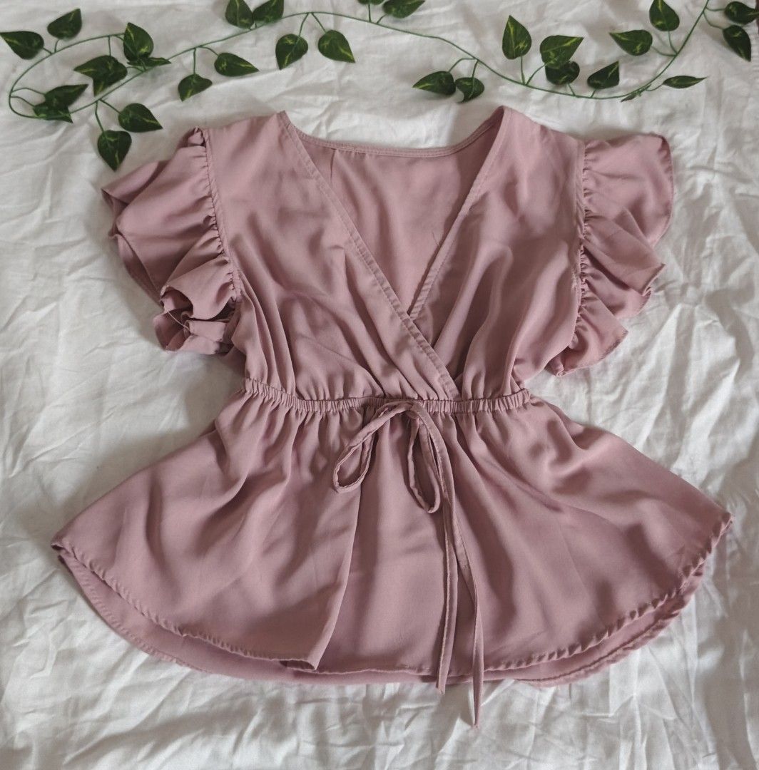 Pink Ruffle Sleeve Wrap Top (Category: Blouses) located in Manila. Submitted by aseyleo (Listing ID 1462897425, Image 1). Description: .
