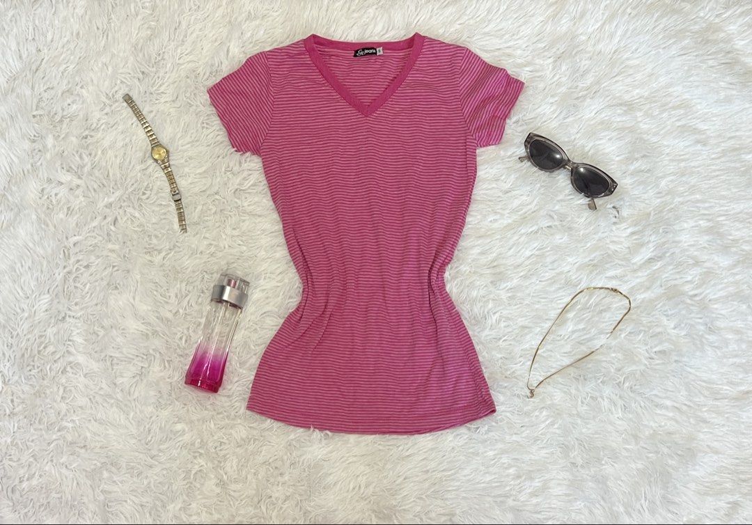 Pink Striped V-Neck T-Shirt (Category: Shirts) located in Tuguegarao City. Submitted by love_clothies (Listing ID 1462901800, Image 1). Description: - Adorable pink striped V-neck t-shirt - Made from soft and stretchy fabric for ultimate comfort - Short sleeves, perfect for everyday wear - Effortlessly pairs with jeans or shorts for a casual look - A simple yet stylish addition to your wardrobe.