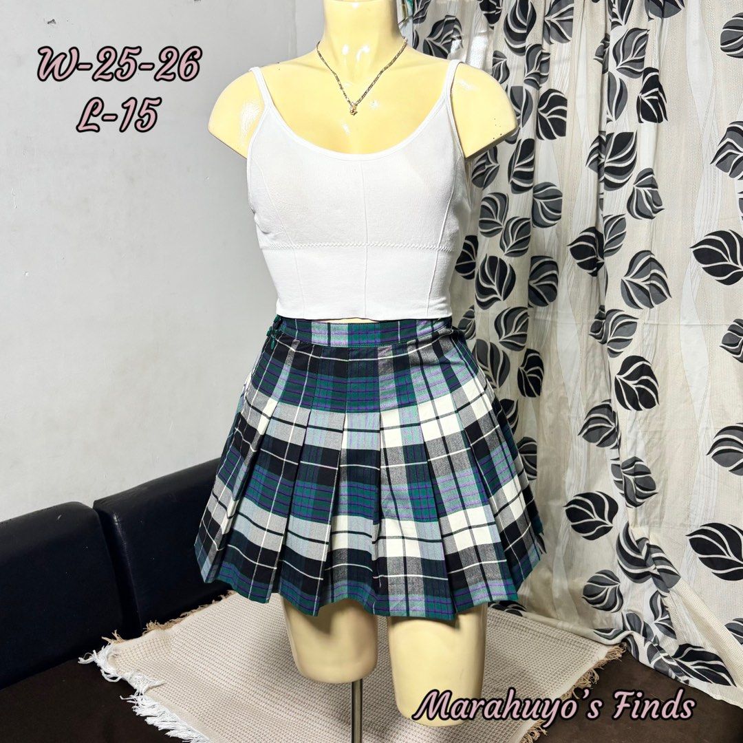 Plaid Pleated Mini Skirt (Category: Skirts) located in Mabalacat. Submitted by marahuyos.finds (Listing ID 1462931351, Image 1). Description: - Cute plaid pleated mini skirt - Fits waist 25-26 inches - Length: 15 inches - Ideal for preppy or Y2K aesthetic - Versatile styling with crop tops or t-shirts - Suitable for casual outings and parties.