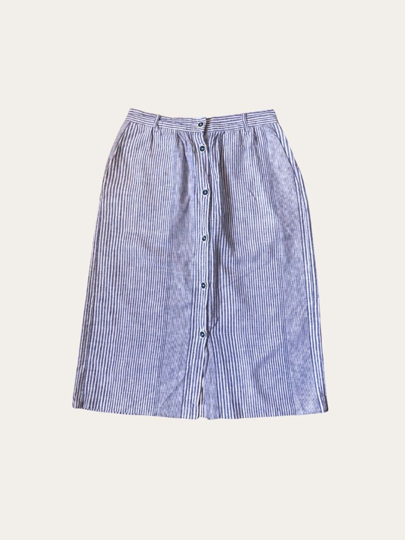 PLAINS & PRINTS Blue Vertical Stripe Button-Front Knee-Length Skirt (Category: Skirts) located in Liliw. Submitted by velvetvandals (Listing ID 1462950929, Image 1). Description: PLAINS & PRINTS Blue Vertical Stripe Button-Front Knee-Length Skirt Nautical blue and white pinstripes with full button-down front / Stretchable waistband / A-line knee-length cut / 100% Cotton ✽ Excellent condition ✽ Shipping from Laguna, PH.