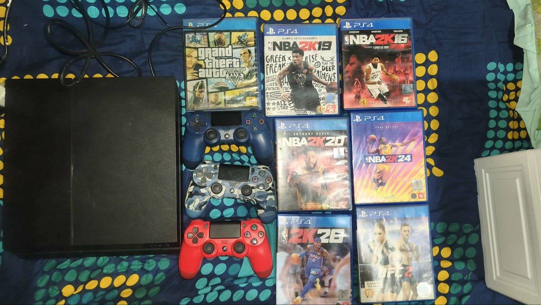 PlayStation 4 Console Bundle with Multiple NBA 2K Games (Category: PlayStation) located in Calasiao. Submitted by kielsthrift (Listing ID 1463108499, Image 1). Description: PlayStation 4 (PS4) console 1 TB Controllers: Three distinct DualShock Free 💿 Physical Games (PS4) Grand Theft Auto V (Premium Edition) NBA 2K16 NBA 2K19 NBA 2K20 NBA 2K23 NBA 2K24 EA Sports UFC 2 Free: HDMI Cord Price: 20k lahat na po.