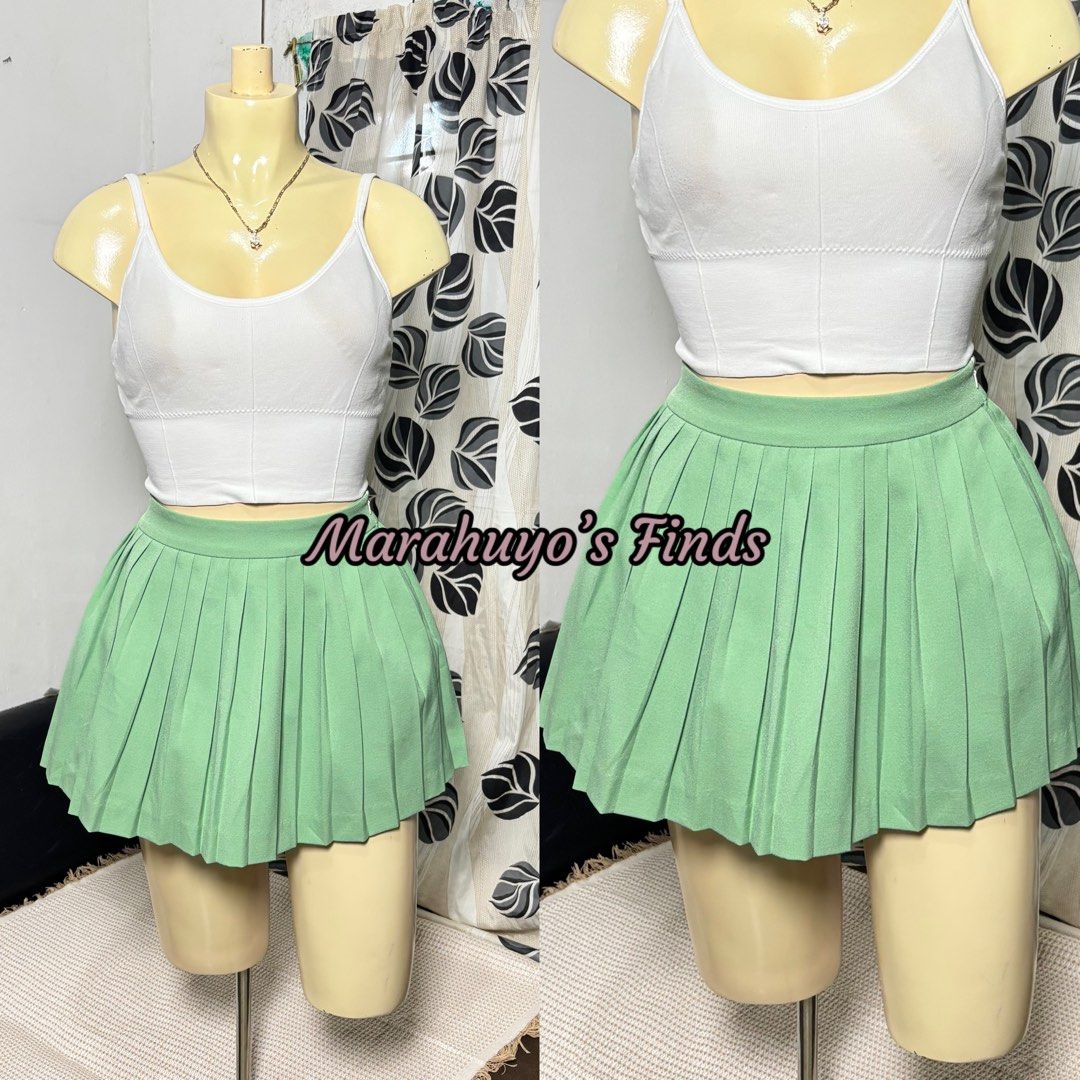 Pleated Mini Skirt - Size M - Light Green (Category: Skirts) located in Mabalacat. Submitted by marahuyos.finds (Listing ID 1462930713, Image 2). Description: - Cute light green pleated mini skirt - High-waisted style - Pairs well with crop tops or t-shirts - Versatile for casual outings or nights out - Easy to wear and style.