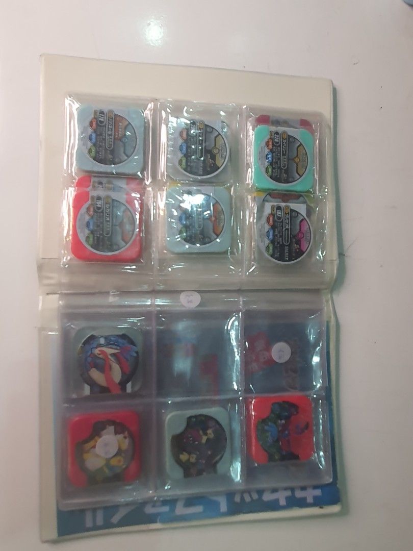 Pokemon Tretta arcade coin with binder (Category: Character Goods) located in Tarlac. Submitted by ziv_surplus (Listing ID 1462925291, Image 3). Description: Pokemon Tretta arcade coin with binder 15 pcs.