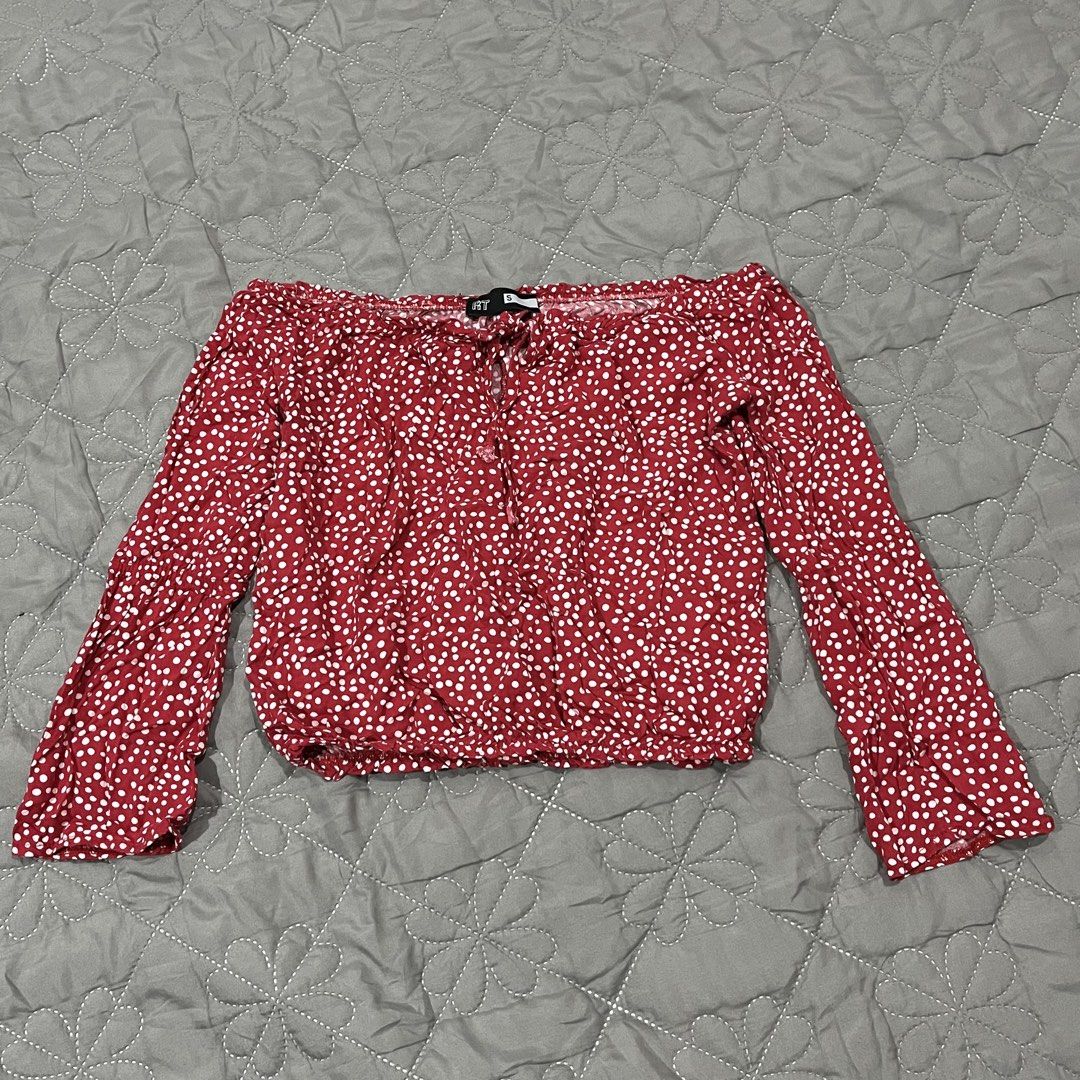 polka dot off-shoulder long sleeve crop top (Category: Blouses) located in Quezon City. Submitted by reesedeclutters (Listing ID 1462940606, Image 1). Description: - Cute off-shoulder design - Red and white ditsy floral print - Long sleeves - Tie detail at the neckline - Elasticated hem for a gathered effect - Versatile for casual wear or nights out - Easy to pair with jeans or shorts.