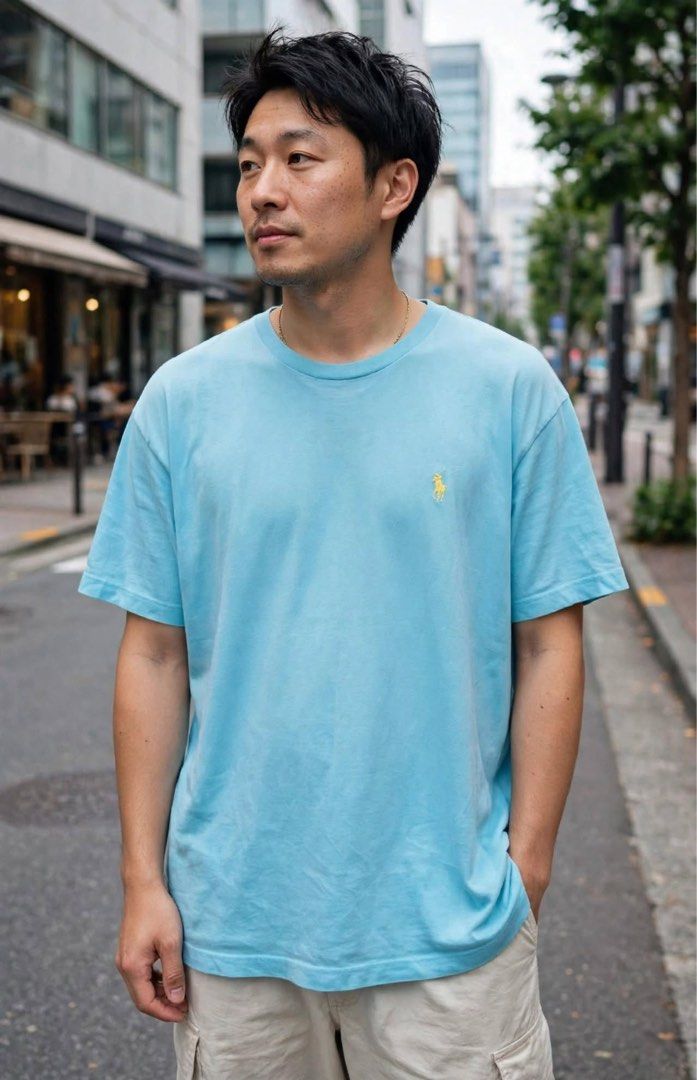 Polo Ralph Lauren Light Blue - Authentic (Category: Tshirts & Polo Shirts ) located in San Pedro. Submitted by lifebeginsaftercoff33 (Listing ID 1463022735, Image 1). Description: - Authentic Light blue Polo Ralph Lauren T-shirt - Classic yellow embroiderd RL logo on chest - Size: Large (L/G) on tag - Dimes: 23 x 28 in (Upto XL) - Material: 100% Cotton - Origin: Made in Indonesia - Ideal for casual everyday wear - Very soft comfy stretchy light f