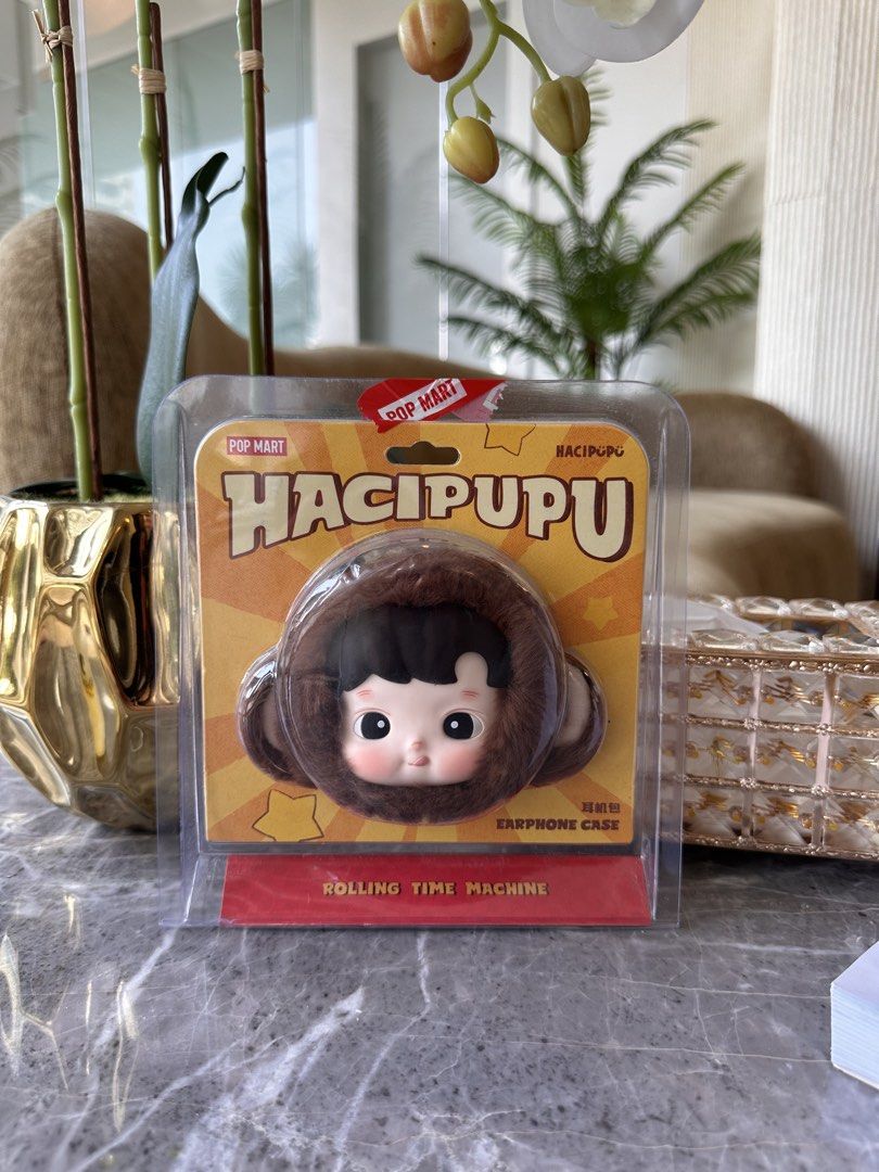 POP MART HACIPUPU Rolling Time Machine Earphone Case (Category: Designer & Blind Box Toys) located in Makati City. Submitted by msjlarsen (Listing ID 1462922525, Image 1). Description: - POP MART HACIPUPU earphone case - Design: Rolling Time Machine - Comes in original packaging - Protects your earphones - Fun and collectible item.