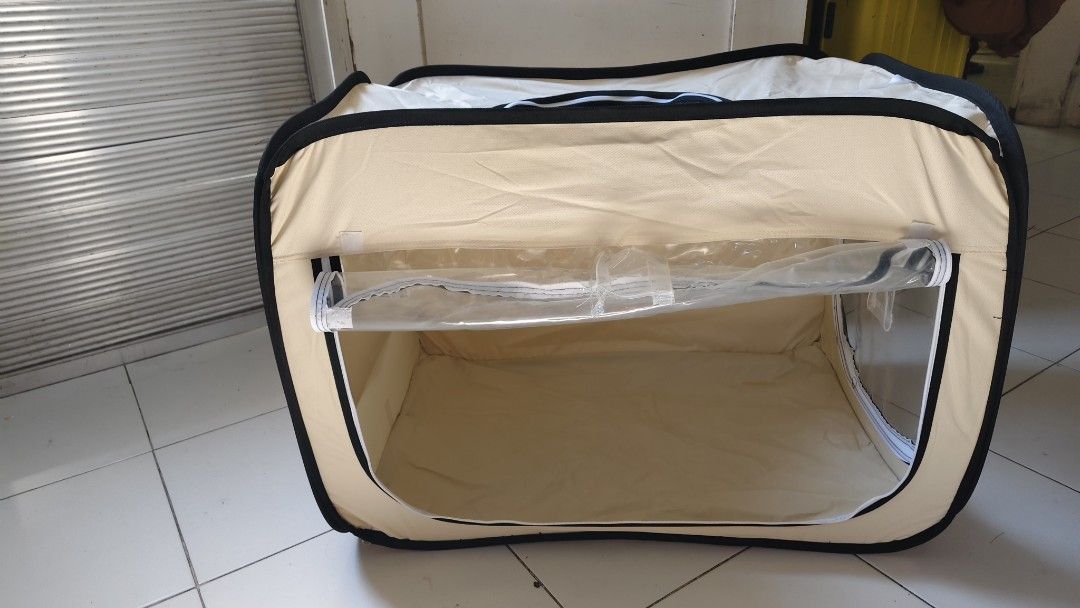Portable Pet Tent/Crate with Mesh Windows (Category: Homes & Other Pet Accessories) located in Bulacan. Submitted by babz30261 (Listing ID 1462964622, Image 1). Description: - Lightweight and foldable for easy portability - Mesh windows ensure excellent ventilation - Simple to set up and take down in minutes - Features a convenient zippered opening - Ideal for both travel and home use - Stylish neutral beige fabric with black trim.