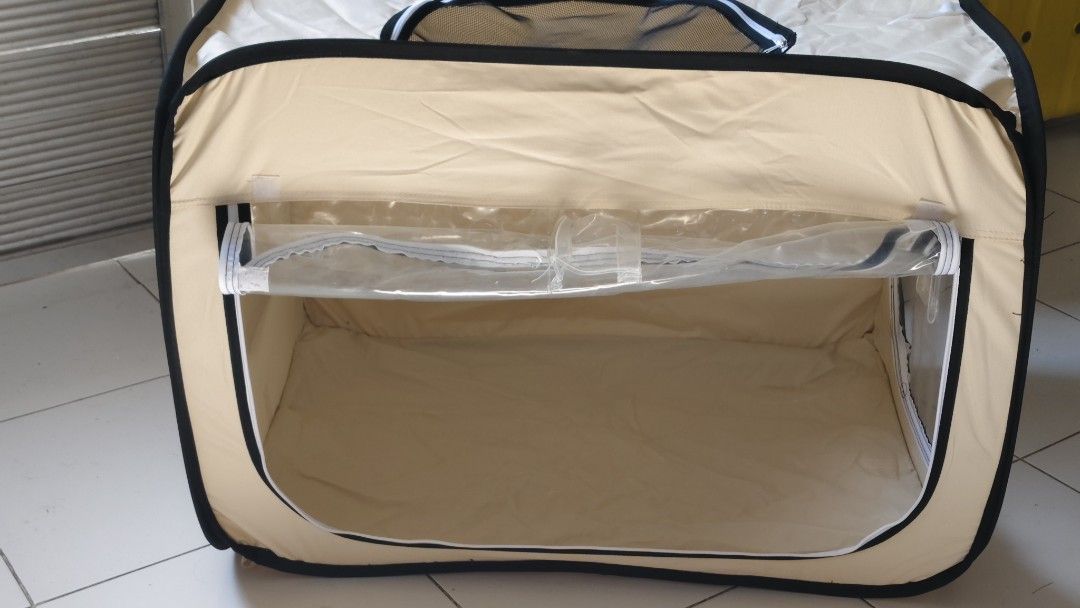 Portable Pet Tent/Crate with Mesh Windows (Category: Homes & Other Pet Accessories) located in Bulacan. Submitted by babz30261 (Listing ID 1462964622, Image 2). Description: - Lightweight and foldable for easy portability - Mesh windows ensure excellent ventilation - Simple to set up and take down in minutes - Features a convenient zippered opening - Ideal for both travel and home use - Stylish neutral beige fabric with black trim.