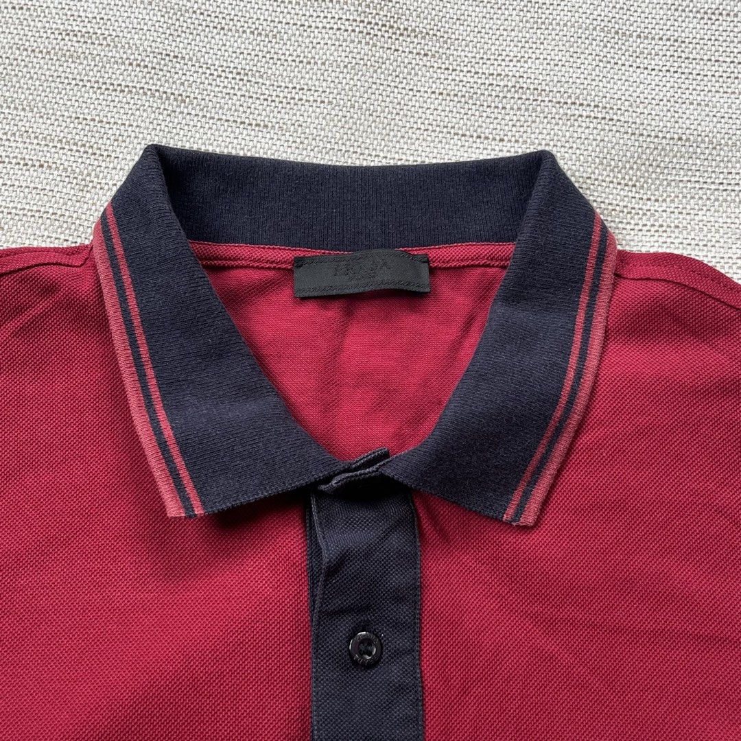 Prada Red Tab Polo Shirt (Category: Luxury Apparel) located in Panabo. Submitted by curated.dept (Listing ID 1462951985, Image 2). Description: size medium 20 width, 26 length excellent condition 9/10 color rate flawless/no issues free shipping.