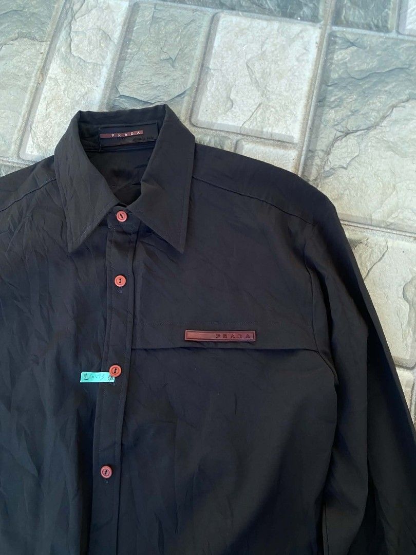 Prada redtab longsleeves (Category: Tshirts & Polo Shirts ) located in Ilog. Submitted by mikesthrift_ (Listing ID 1462970488, Image 2). Description: prada red tab longsleeves medium fittings spandex material nylon stretch missing washtags price : 450+s dm if interested.
