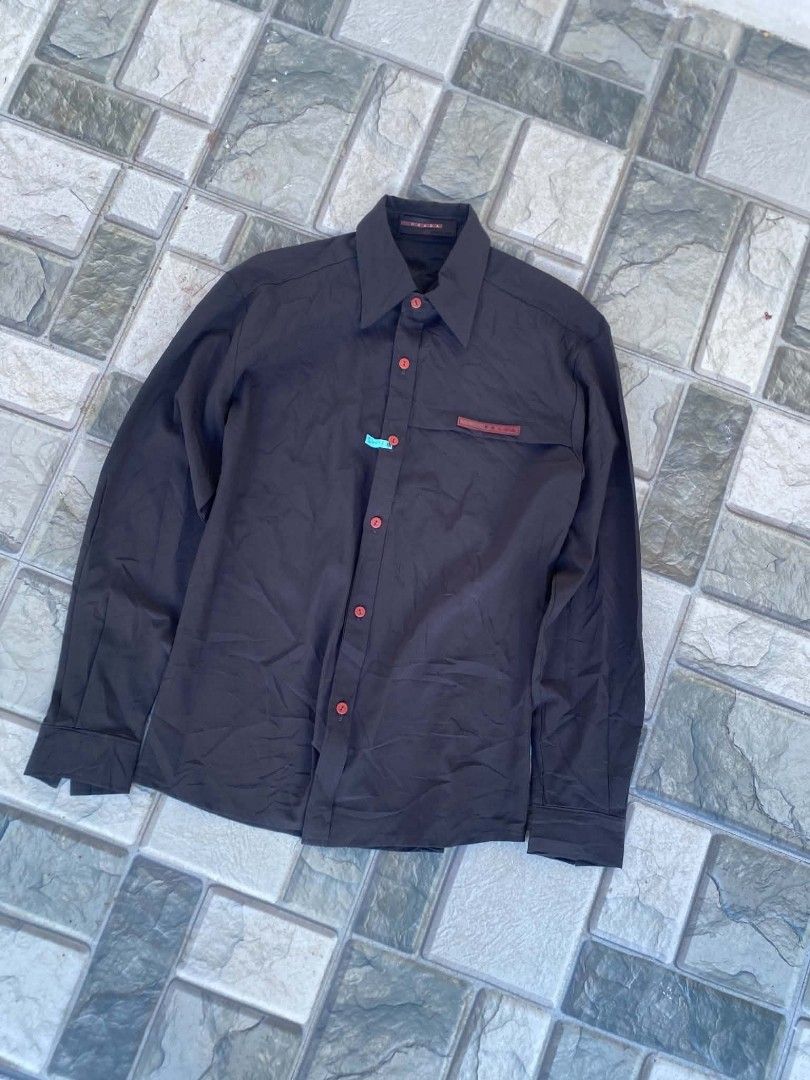 Prada redtab longsleeves (Category: Tshirts & Polo Shirts ) located in Ilog. Submitted by mikesthrift_ (Listing ID 1462970488, Image 1). Description: prada red tab longsleeves medium fittings spandex material nylon stretch missing washtags price : 450+s dm if interested.