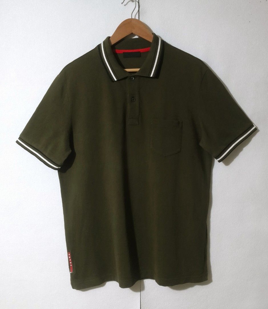 Prada side tab logo (Category: Tshirts & Polo Shirts ) located in Iligan City. Submitted by jh_pr0 (Listing ID 1463032687, Image 1). Description: Prādá. (olive green) Red side tab logo Like new Dimes: 22x30 Color rate: 9.8/10 No issue Mine: 1200+sf.