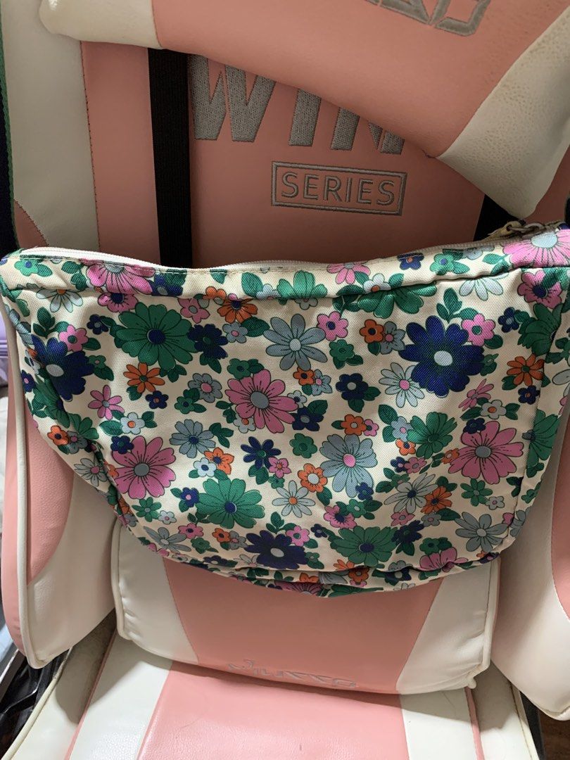 Preloved Cath Kidston sling bag (Category: Cross-body Bags) located in General Trias. Submitted by vpshoppe (Listing ID 1463053293, Image 2). Description: Preoved Cath Kidston sling bag floral design used but not abused with minimal stains inside the bag pls see photos for decluttering.