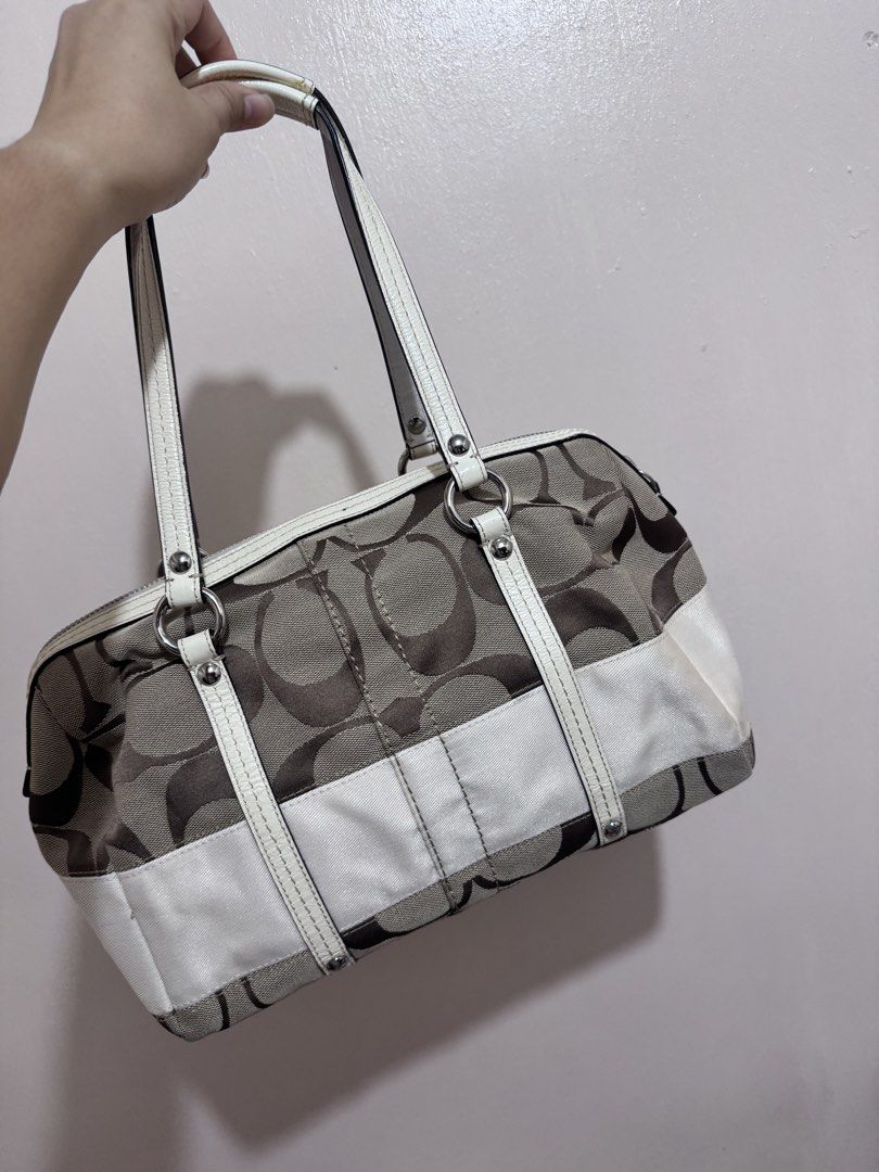 Preloved Coach Satchel White Canvas (Category: Shoulder Bags) located in Manila. Submitted by jammmieee1127 (Listing ID 1463062249, Image 2). Description: Coach F13551 Satchel White Canvas With visible glue sa handle pero good condi yan Please see photo for reference RFS: Not using it.