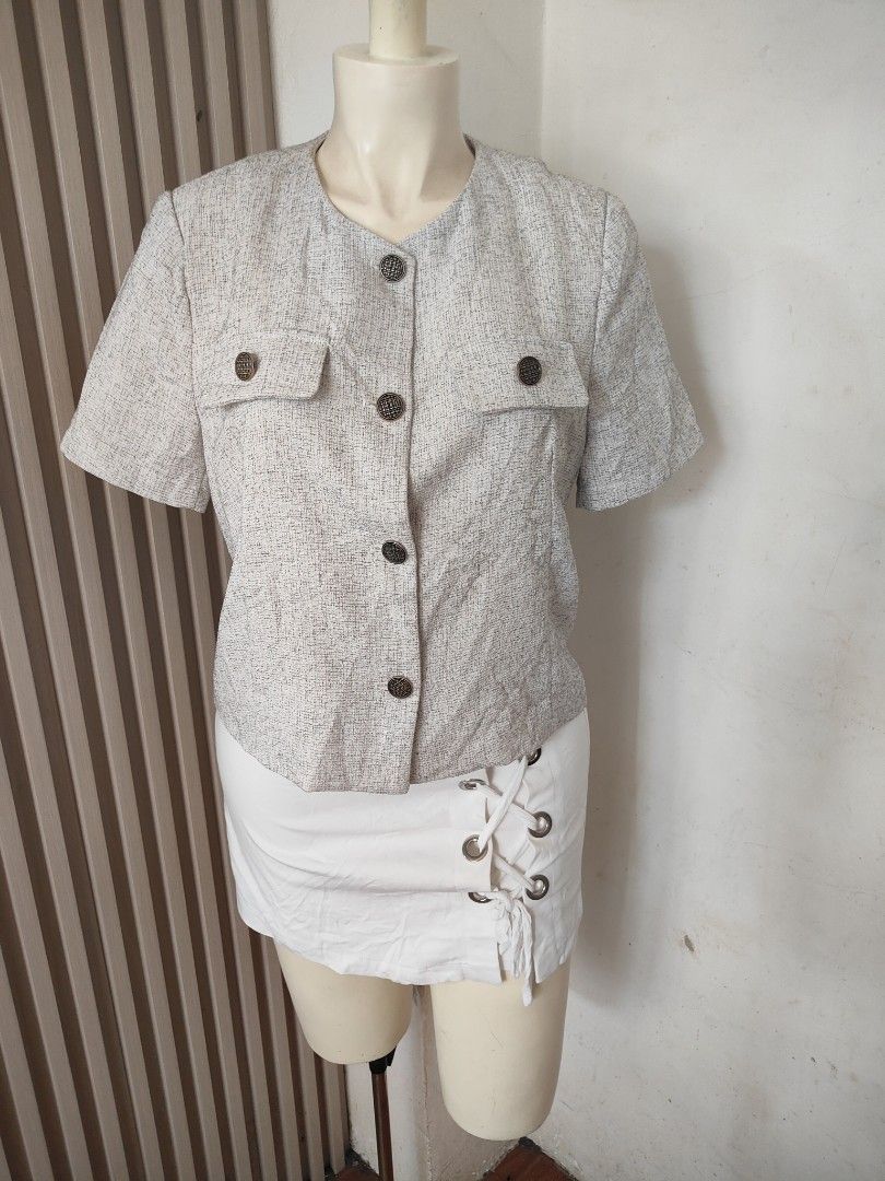 Premium Tweed Short Sleeve Button Up Top - Medium (Category: Blouses) located in San Carlos City. Submitted by chinx008 (Listing ID 1463031240, Image 3). Description: - Grey tweed top - Short sleeves - Button-up front - Two chest pockets with button details - Textured fabric - Versatile for dressing up .