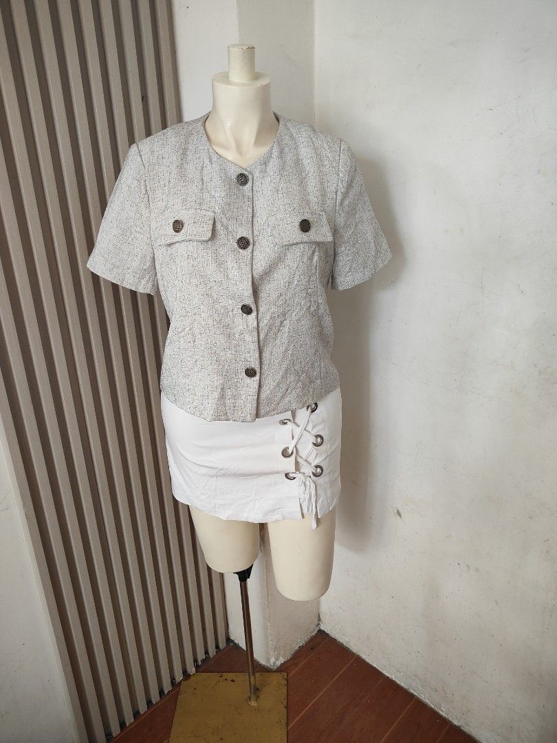 Premium Tweed Short Sleeve Button Up Top - Medium (Category: Blouses) located in San Carlos City. Submitted by chinx008 (Listing ID 1463031240, Image 2). Description: - Grey tweed top - Short sleeves - Button-up front - Two chest pockets with button details - Textured fabric - Versatile for dressing up .