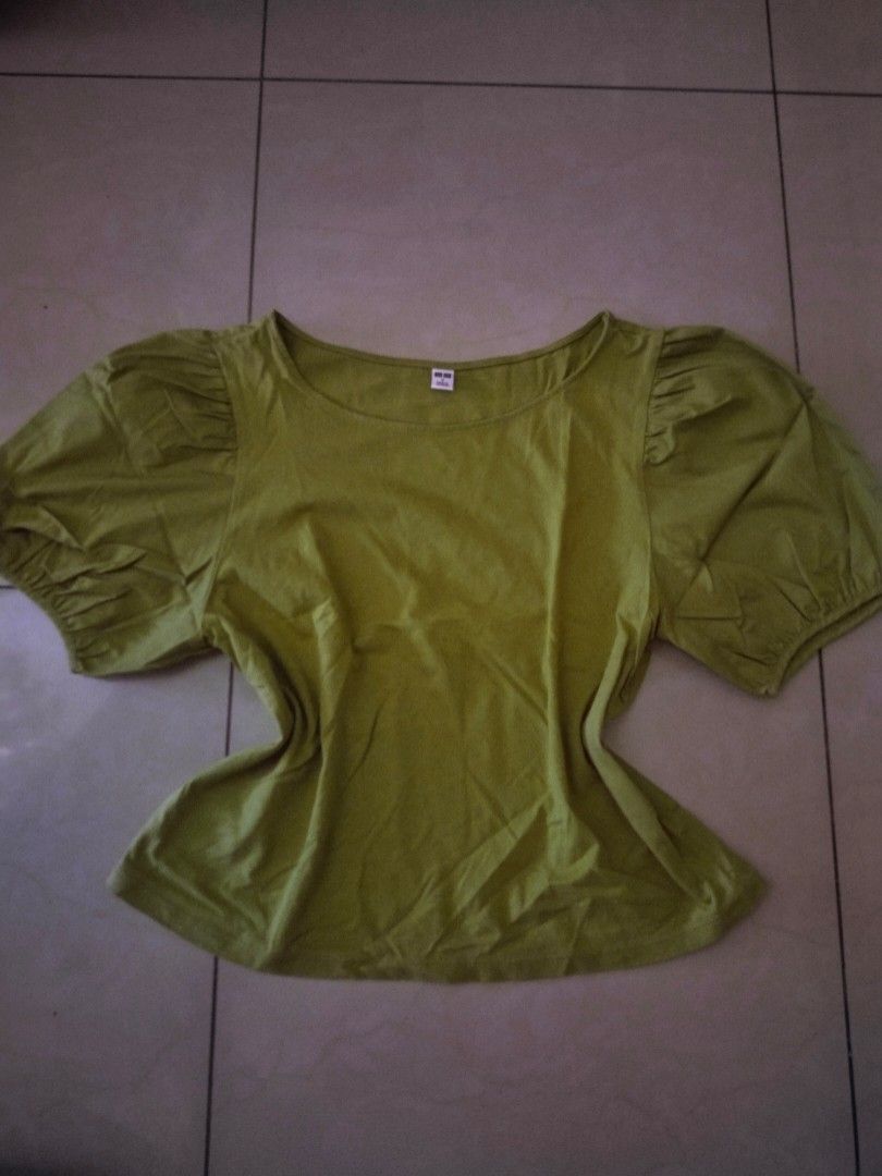 Uniqlo Puff Sleeve Round Neck Top (Category: Blouses) located in Manila. Submitted by bananace143 (Listing ID 1462901425, Image 1). Description: - cute puff sleeve design - round neckline - available in lime green and dusty rose - comfortable and stylish for everyday wear - great for casual outings - SIZE: small, but can fit to medium as well (the buyer will handle the shipping fee) mod: lalamove (if malapit lang), j&t, lbc.
